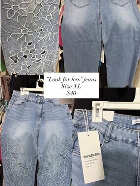 Nina Rossi High-Rise Light Blue Jeans with Floral Cutwork